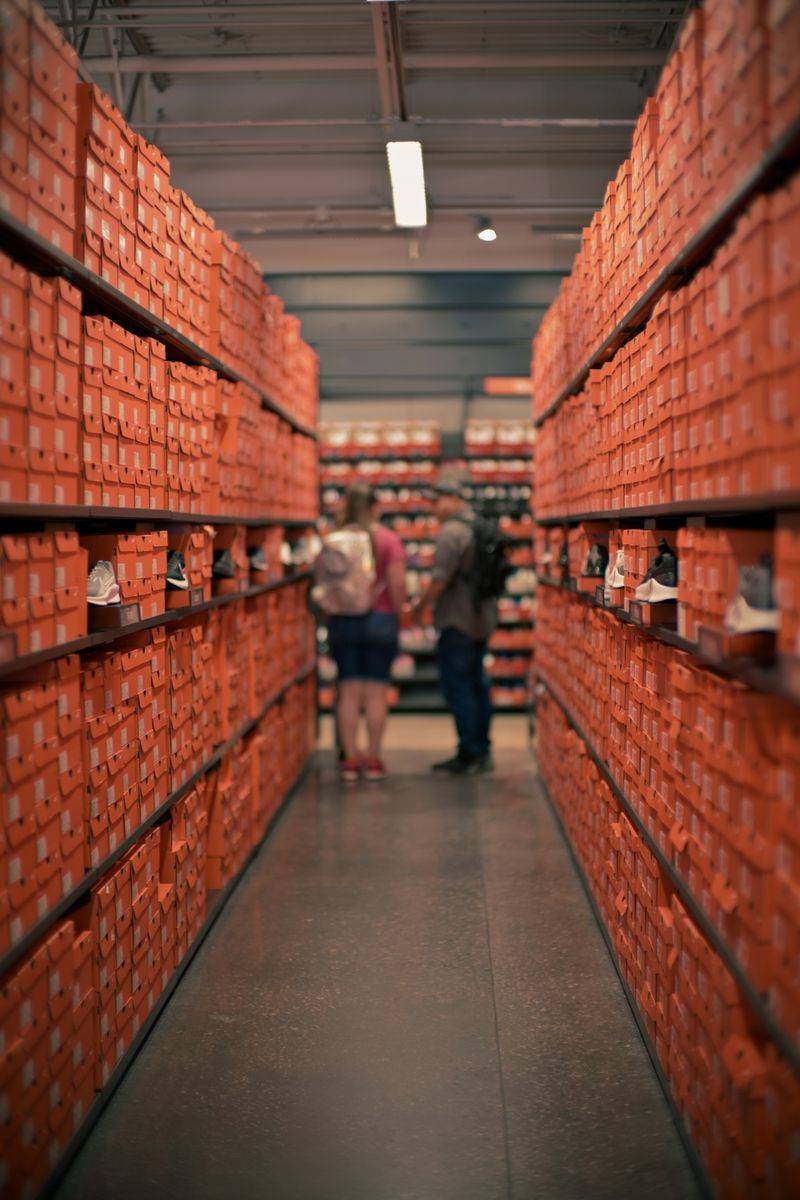 Stacks of orange shoe boxes