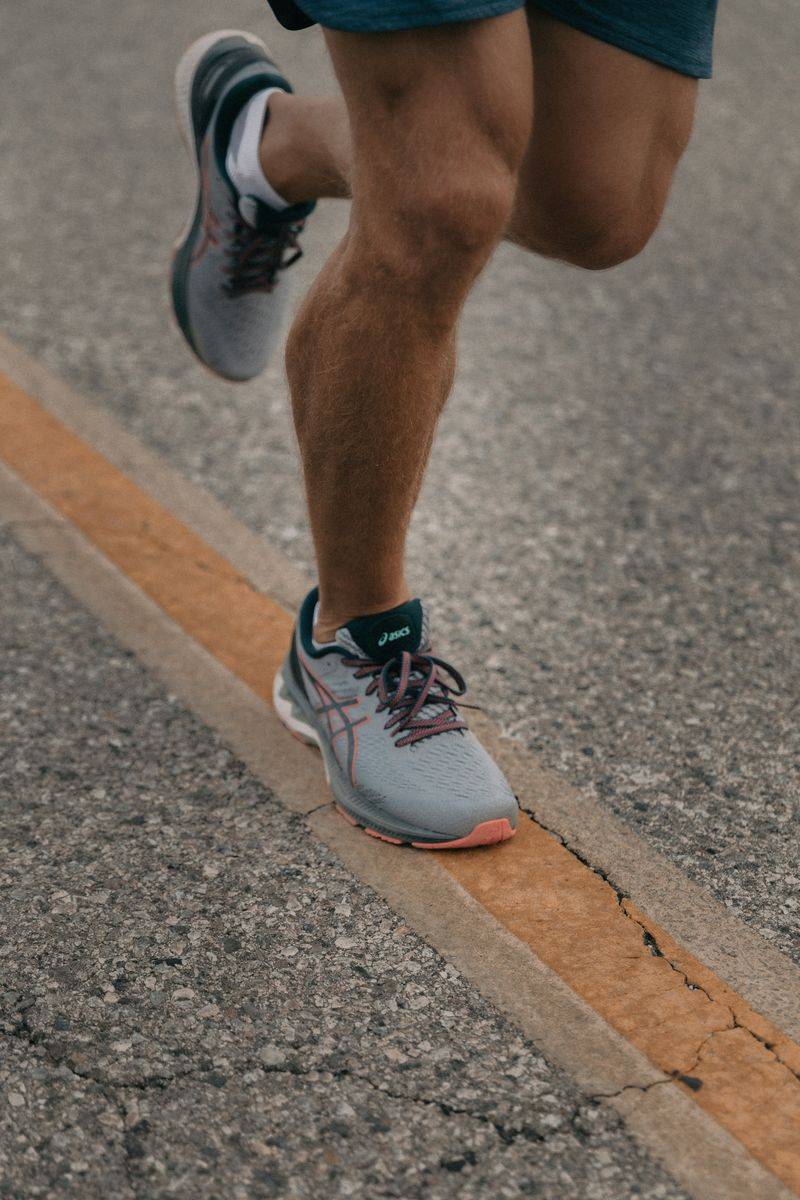A running shoe on pavement